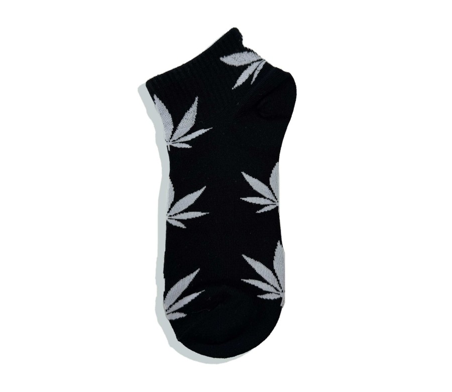 Chaussettes noires avec feuilles de cannabis blanches Chaussettes noires avec feuilles de cannabis blanches
